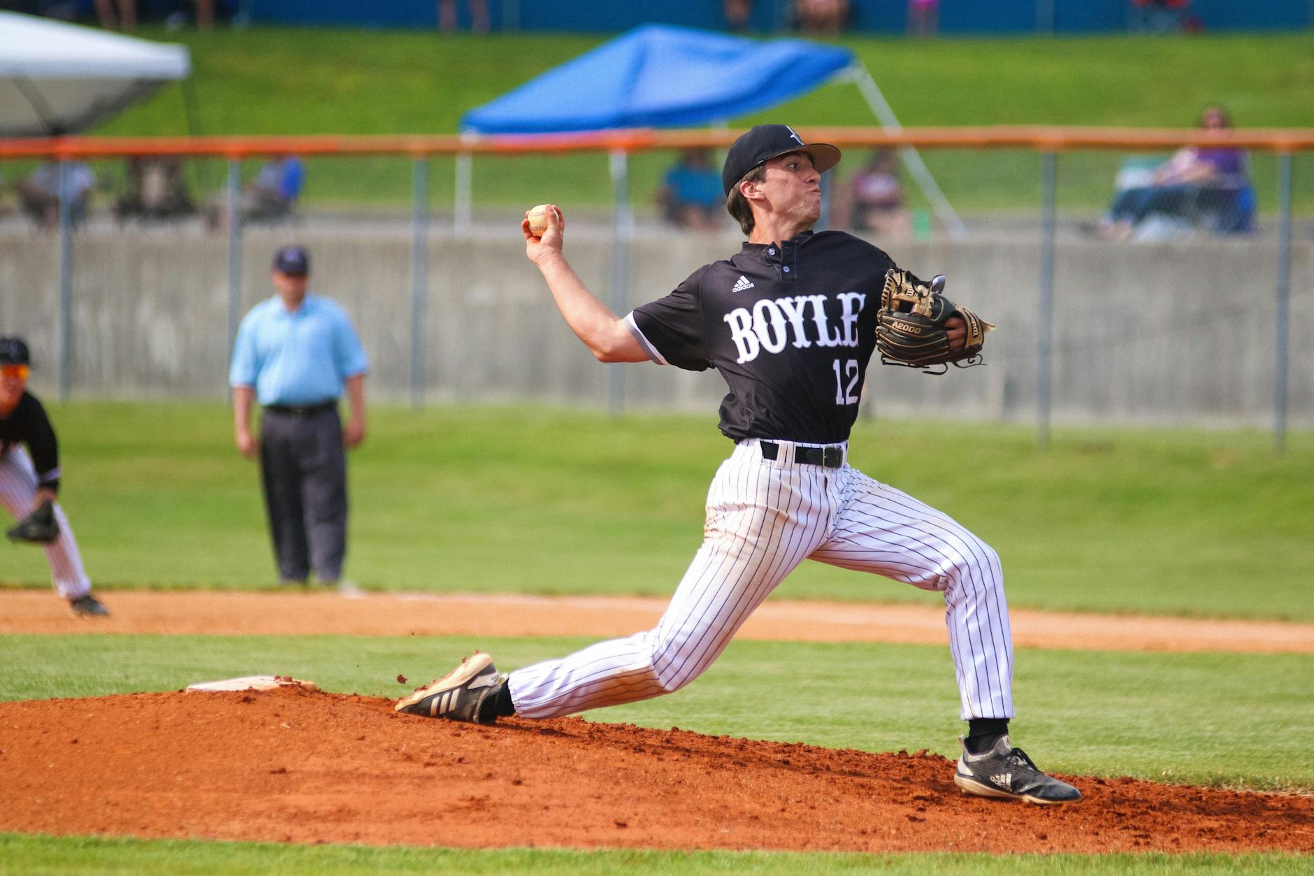 man throwing baseball